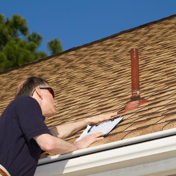 inspector inspecting roof of house santa clara ca